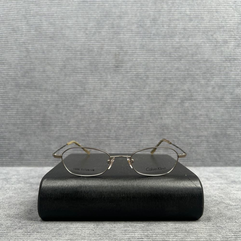 Calvin Klein 531 33 Titanium Oval y2k Eyeglasses Frames Japan 135 Silver Brown
